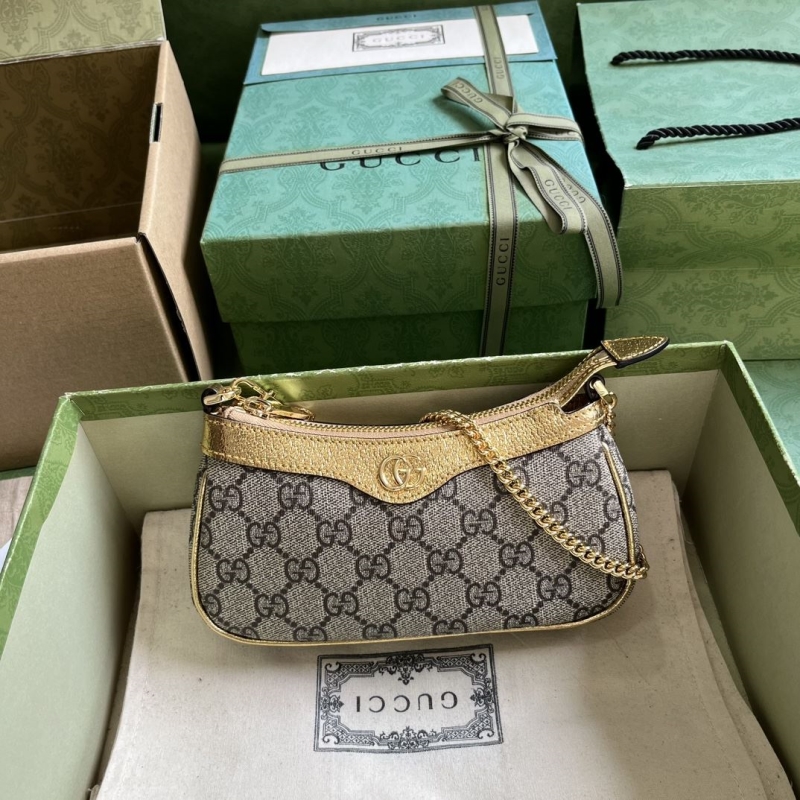 G*u*i top handle bags